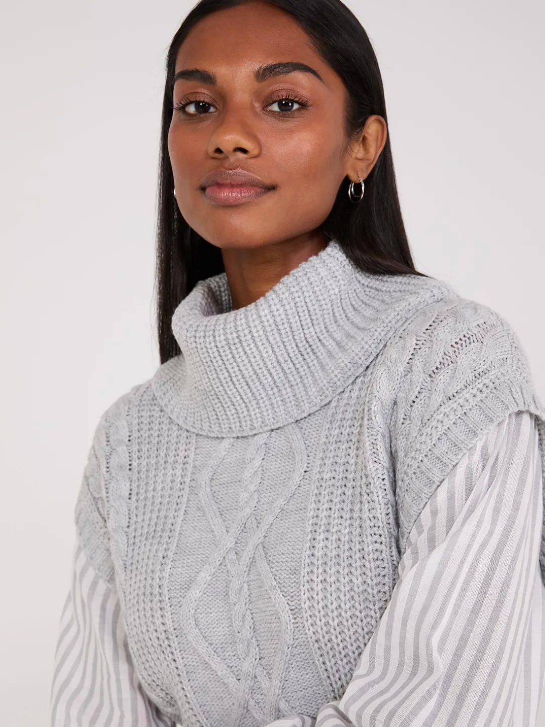 2-Fer Cable Knit Vest With Striped Blouse