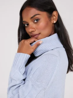 Twisted Cable Knit Turtleneck Sweater